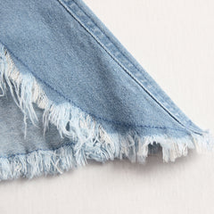 Light blue denim flared long sleeve jumpsuit with wide-leg pants for women, featuring a stylish relaxed fit.