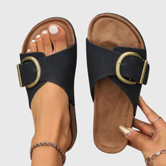 Comfortable women's orthopedic sandals with adjustable buckle strap, supportive footwear ideal for everyday wear.