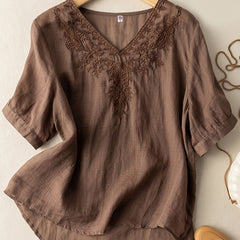 Flowy women's summer linen blouse with V-neck and casual style, featuring a relaxed fit and lightweight fabric.