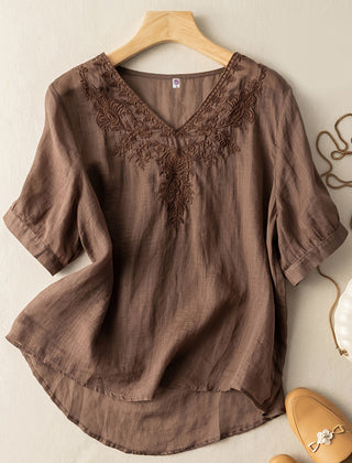 Flowy women's summer linen blouse with V-neck and casual style, featuring a relaxed fit and lightweight fabric.