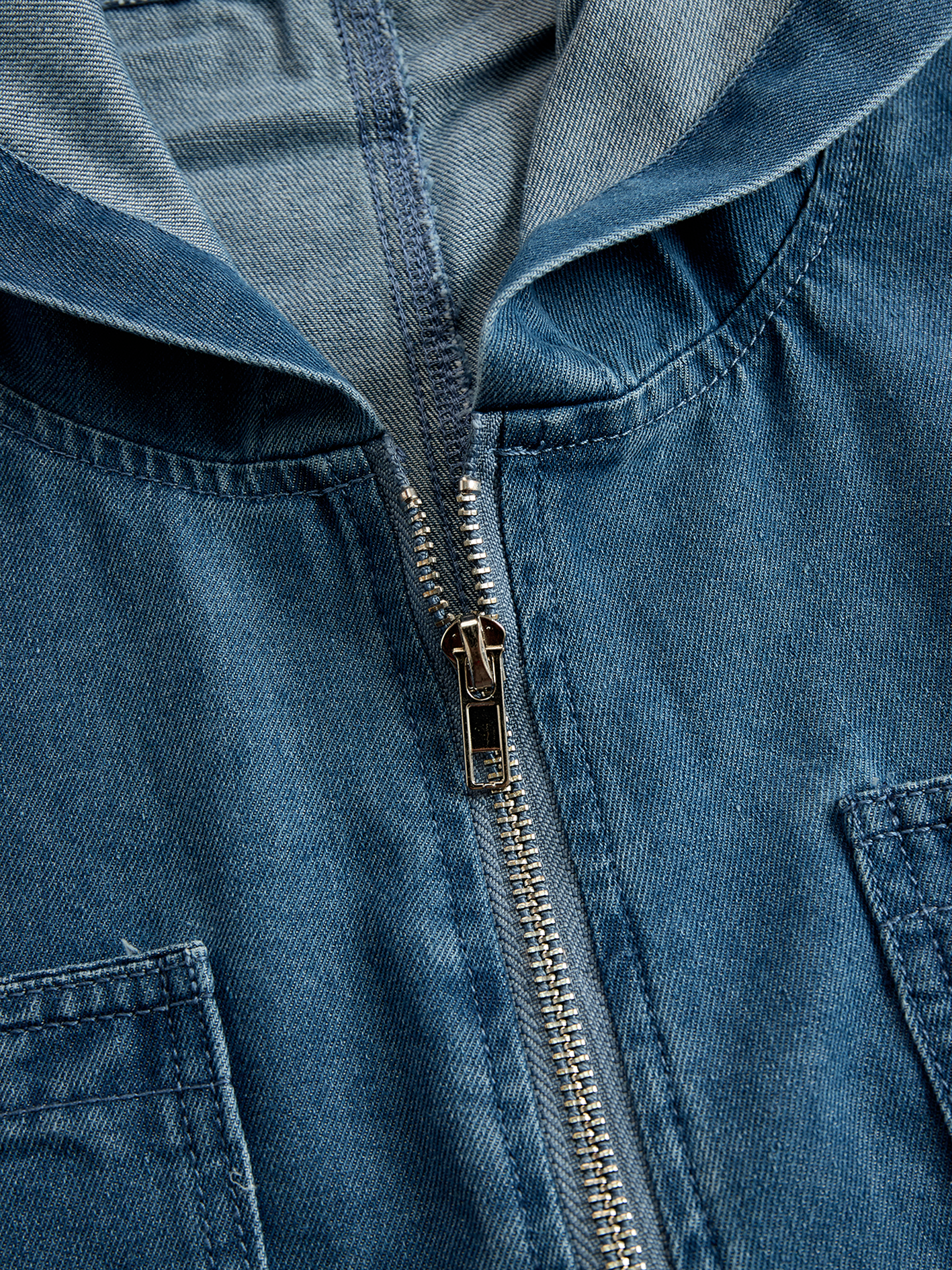 Women’s casual loose fit denim jumpsuit with long sleeves, hood, zipper, and retro pocket design, by My Store.