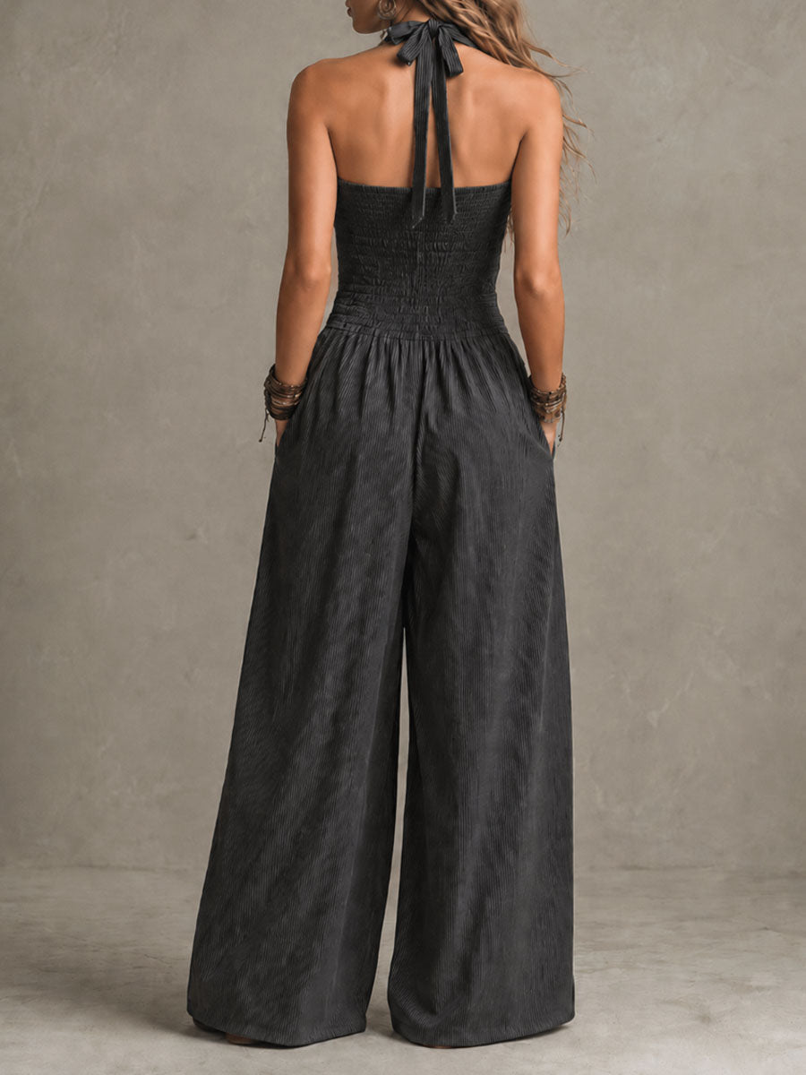 Charcoal pinstripe halter neck wide-leg jumpsuit for women, featuring stylish pants from My Store, displayed on a hanger.
