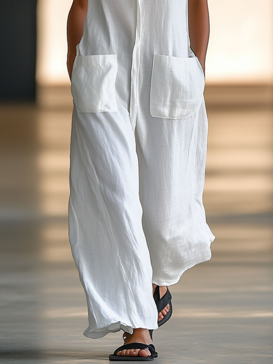 White linen sleeveless wide-leg jumpsuit for women, stylish and comfortable, featuring a relaxed fit and modern design.