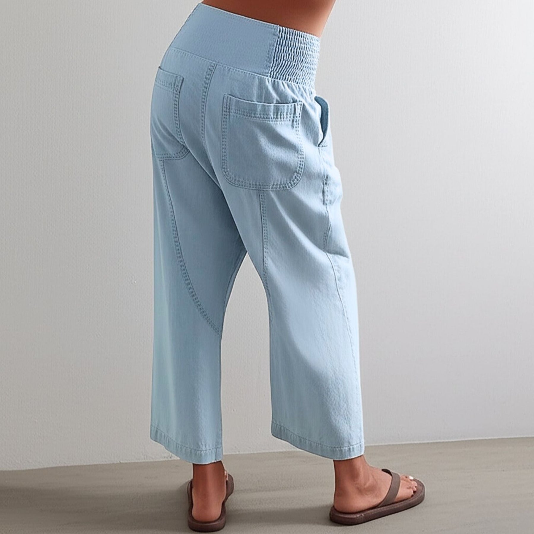 Women's pink harem-cut denim jeans with sculpted fit, casual pants for women, featuring a relaxed and stylish harem silhouette.