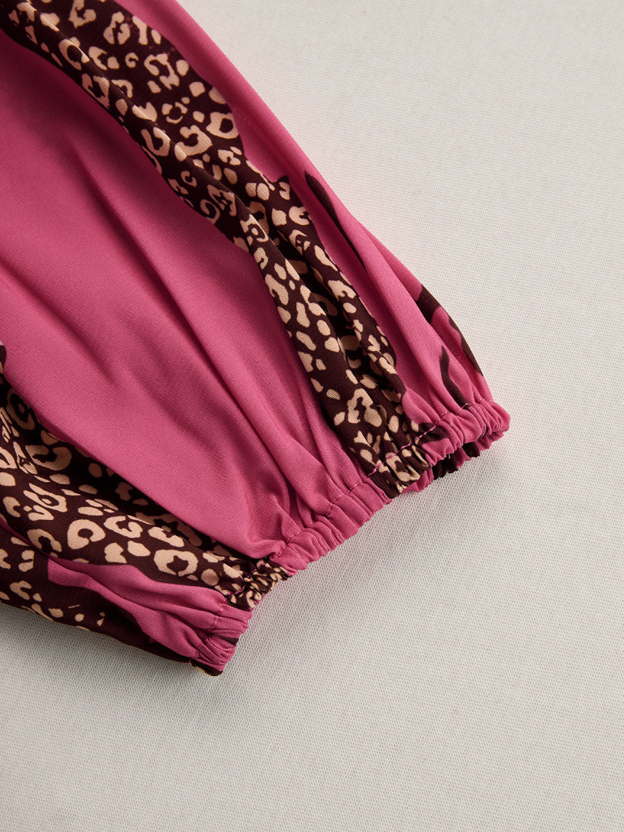 Rose red leopard print chiffon jumpsuit with long sleeves for women, featuring a stylish and flowing design.
