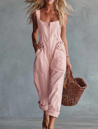 Light yellow denim jumpsuit for women with square neck and zip front, full-length pants, casual style.