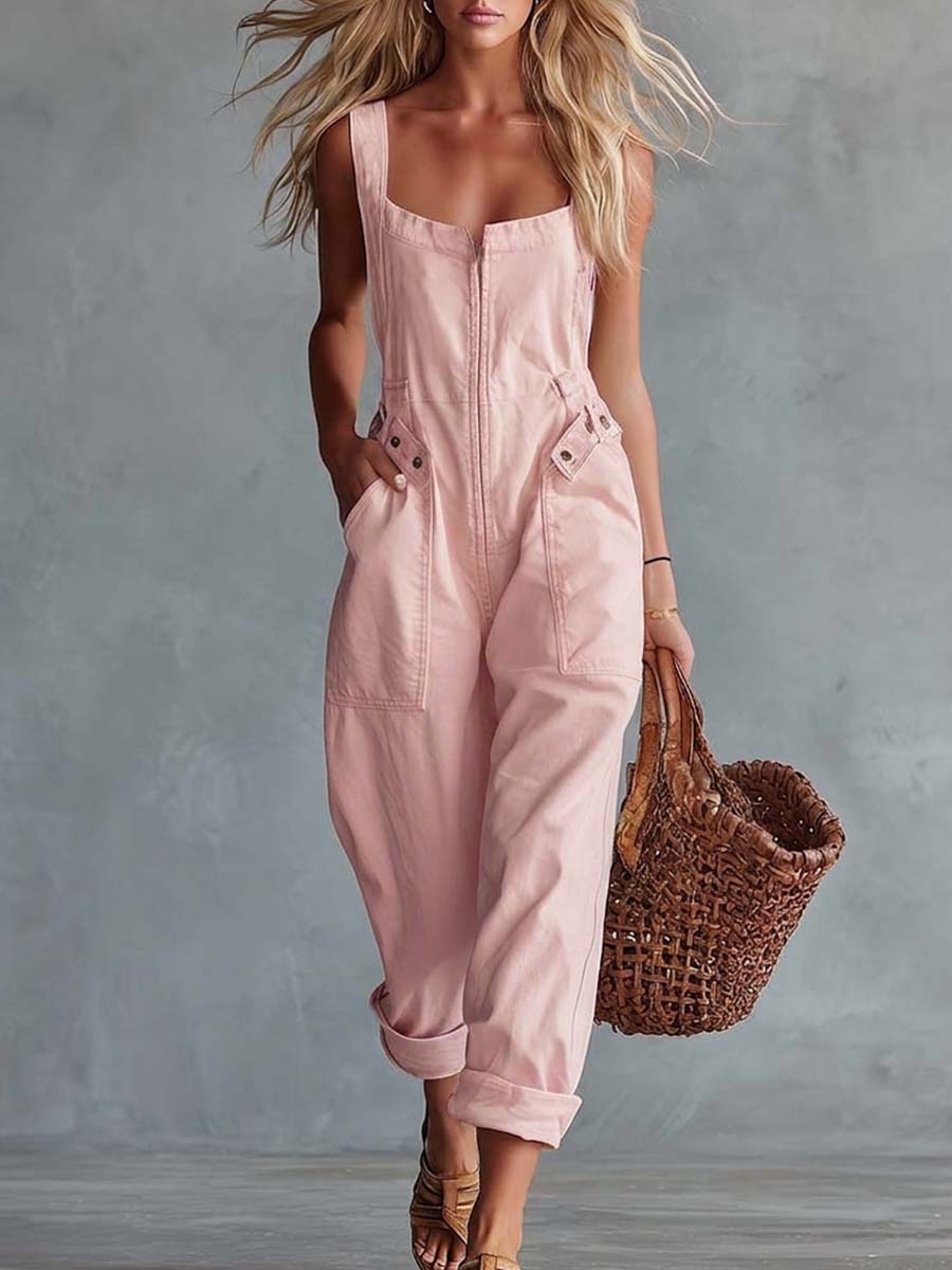 Light yellow denim jumpsuit for women with square neck and zip front, full-length pants, casual style.