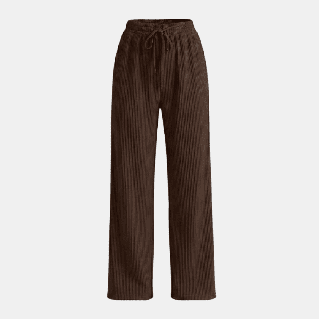 Women's plissé wide-leg trousers by Tammy Bradley, flowy and stylish pants for women, shown in a natural fabric with a relaxed fit.