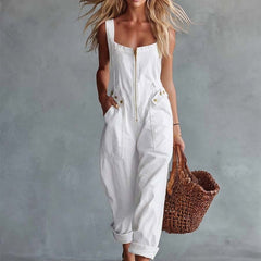 Light yellow denim women's jumpsuit with square neckline and zip-front, featuring stylish design and tailored fit.