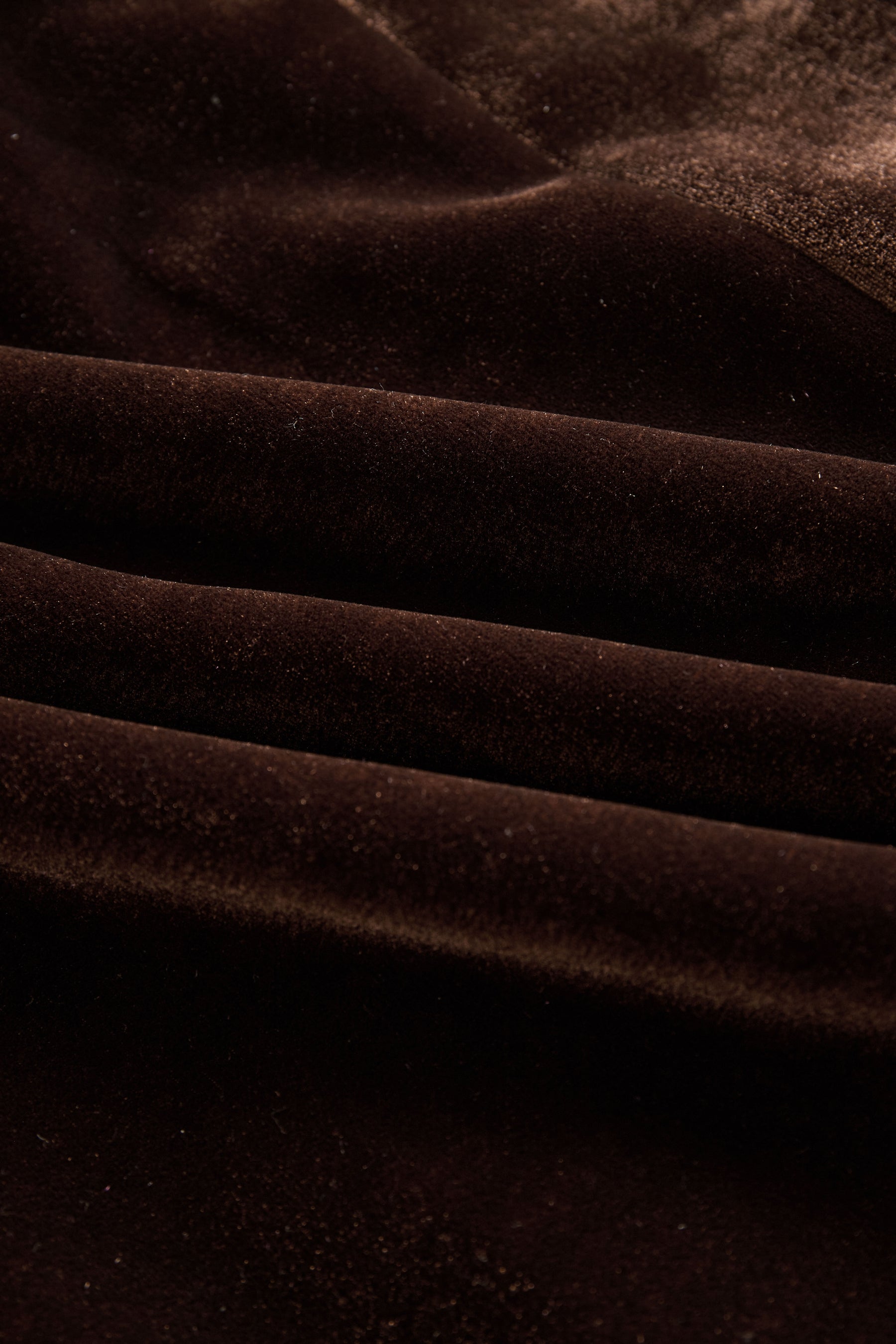 Brown velvet colour-block coat with lapel collar and pockets, stylish long coat by My Store displayed on a hanger.