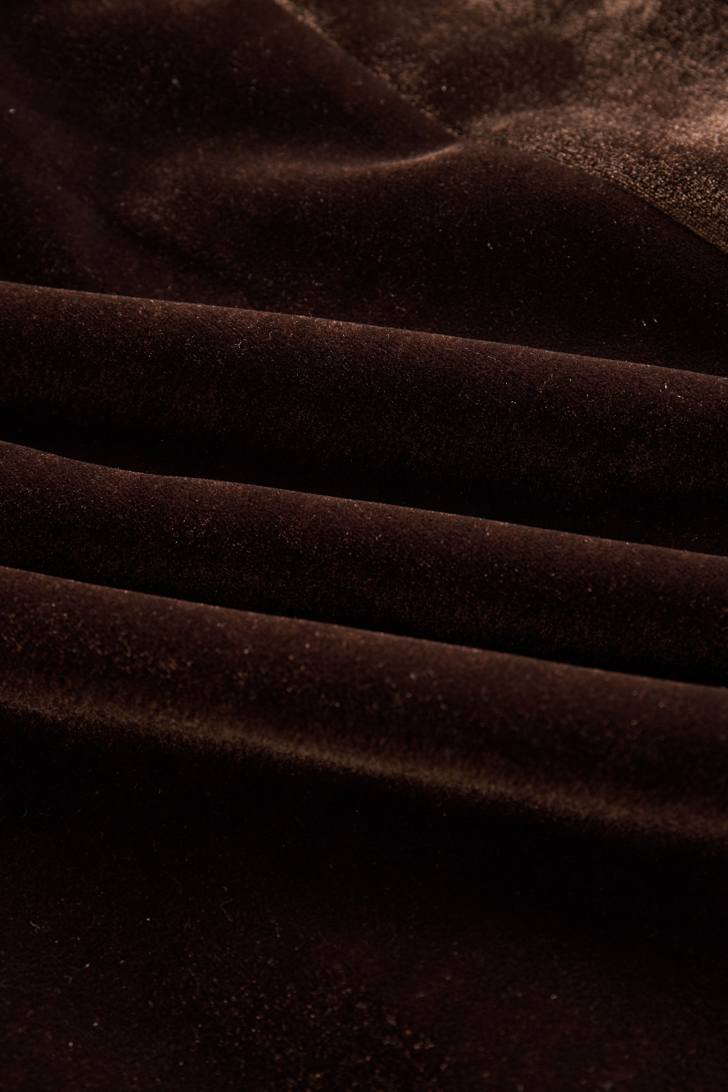 Brown velvet colour-block coat with lapel collar and pockets, stylish long coat by My Store displayed on a hanger.