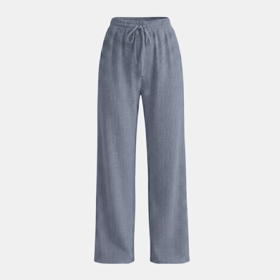 Women's plissé wide-leg trousers by Tammy Bradley, flowing fabric and relaxed fit, shown in a stylish pants women design.