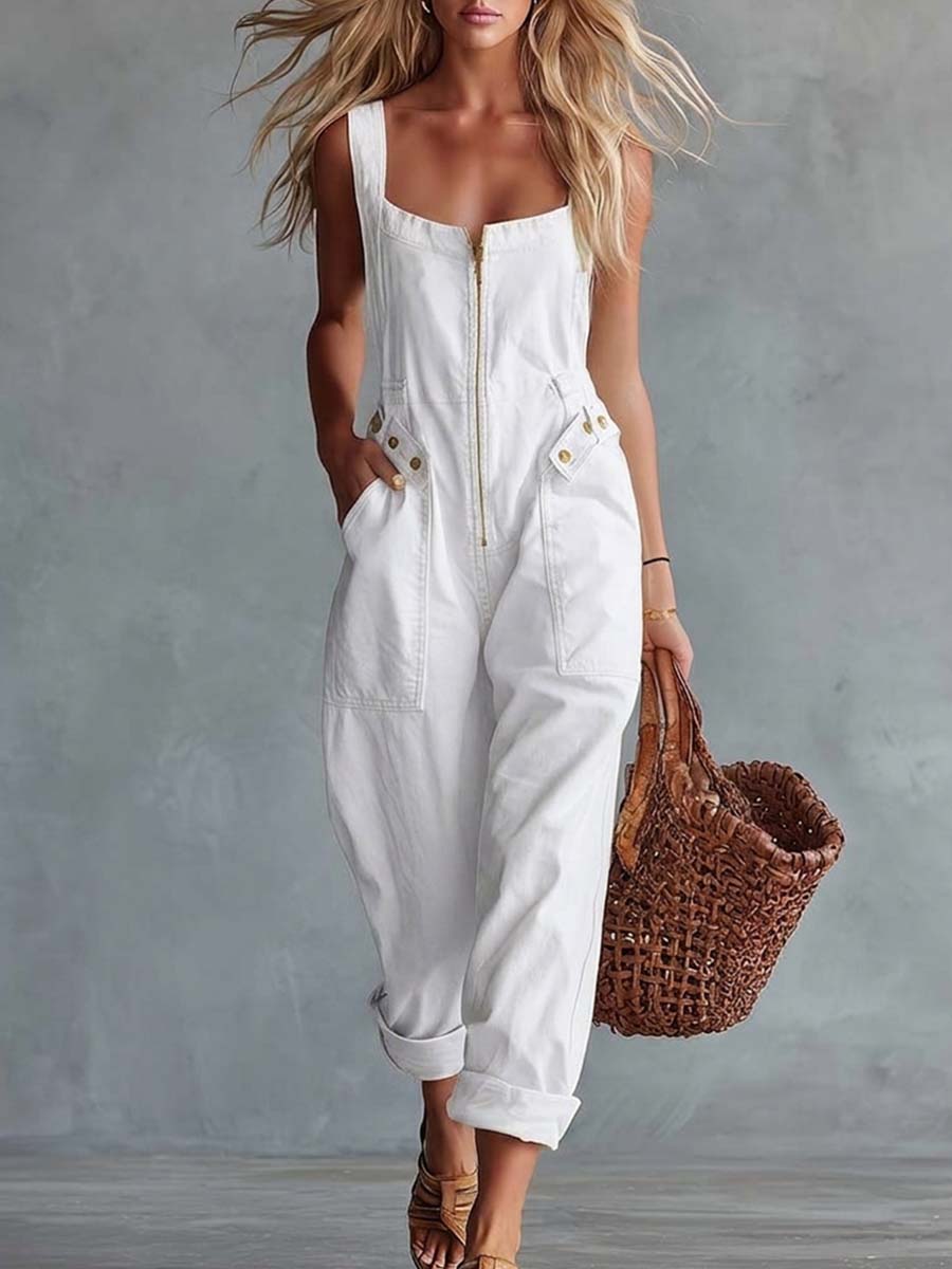 Light yellow denim square neck zip-front jumpsuit for women, featuring long sleeves and a fitted waistband.