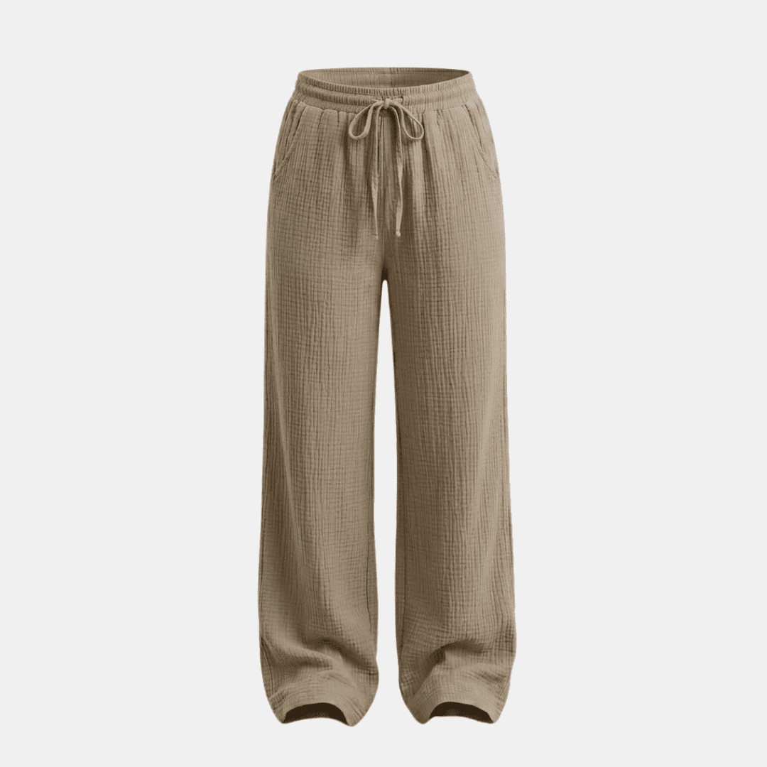 Women's cotton wide-leg trousers by Tammy Bradley, featuring a relaxed fit and comfortable wide-leg design.