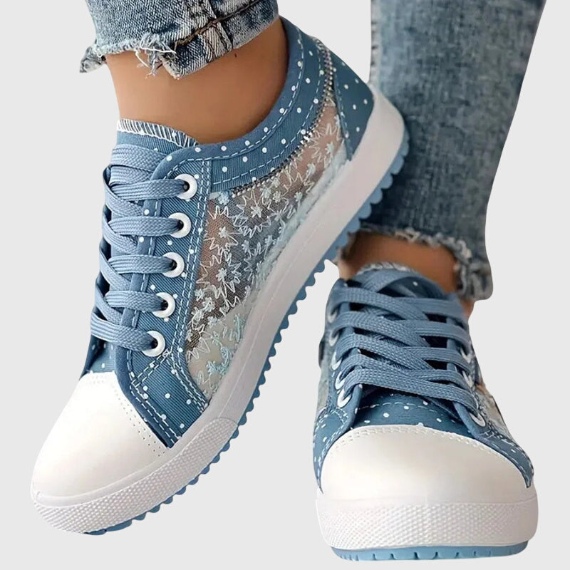 Breathable cushioned orthopedic women's sneakers in stylish design, providing comfort and support for active wear.