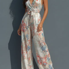 White floral satin halter neck wide-leg jumpsuit for women with wrap front, stylish and elegant pants from My Store.