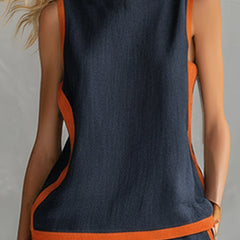 Navy cotton linen two-tone vest and shorts set for men, styled casually with matching fabric and modern design.