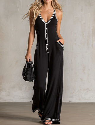 Black color-block sleeveless V-neck button-down jumpsuit for women, featuring stylish pants design and modern silhouette.