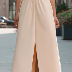 Beige sleeveless midi dress with lapel collar, perfect for summer business wear, shown on model.