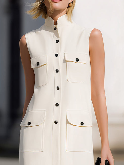 Cream sleeveless utility-pocket button-down shift mini dress for women by Tammy Bradley, featuring a casual, stylish design.