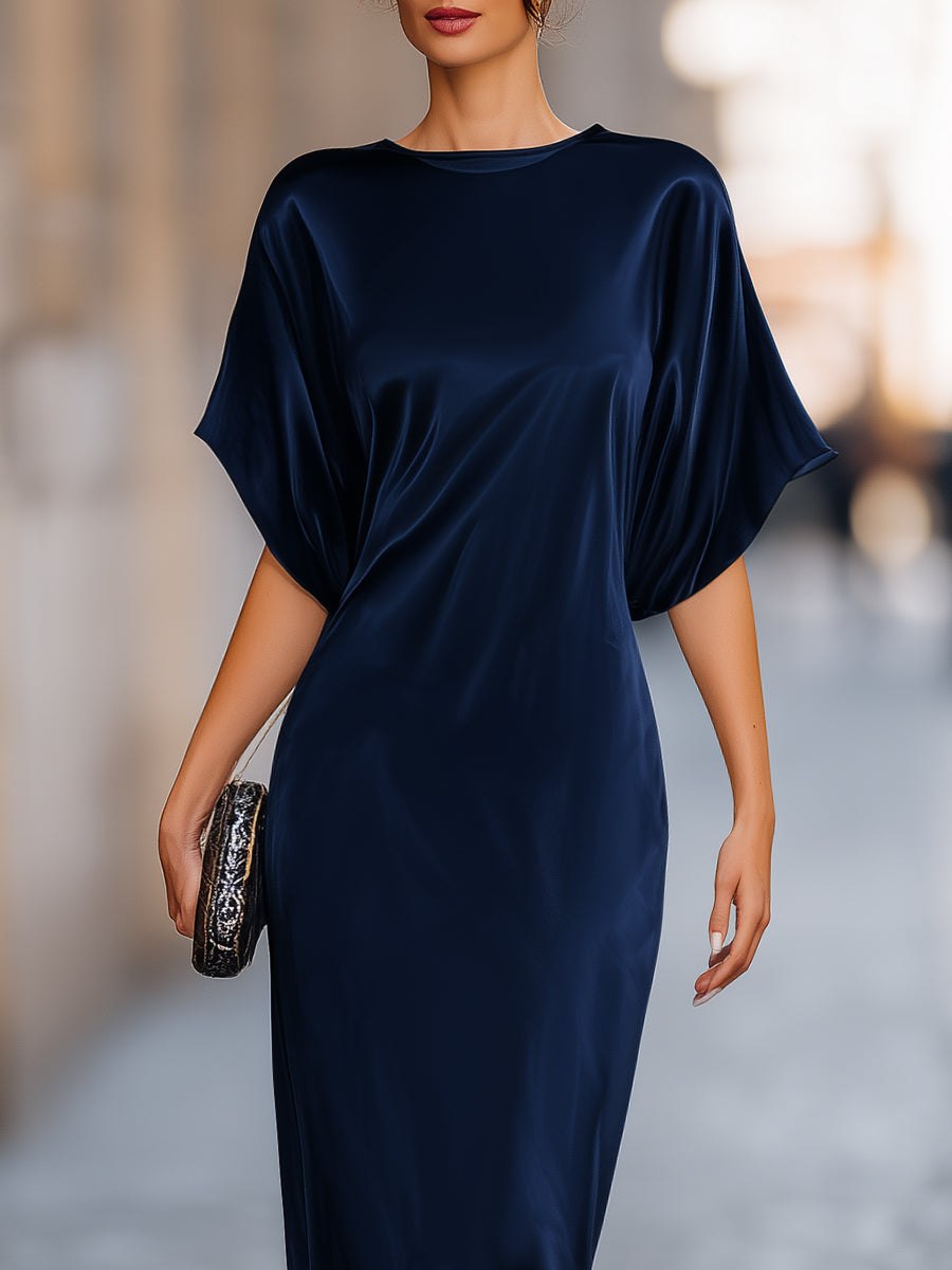 Tammy Bradley women's batwing-sleeve column maxi dress displayed on a model, featuring a flowing silhouette and elegant design.