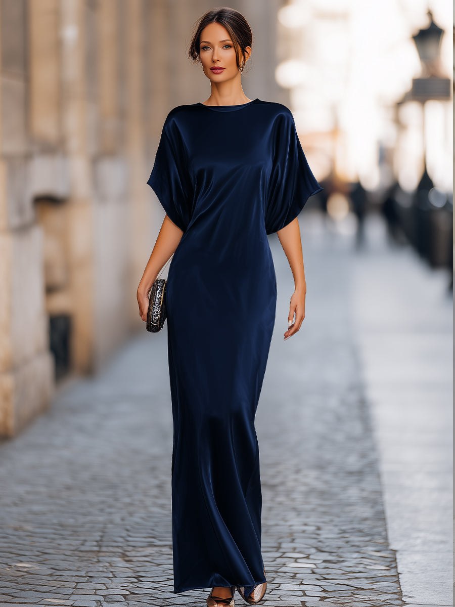 Tammy Bradley women's batwing-sleeve column maxi dress displayed on a model, featuring a flowing silhouette and elegant design.