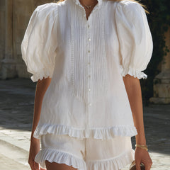 White linen puff sleeve two-piece co-ord set for women featuring high-waisted pants and a matching puff sleeve top.