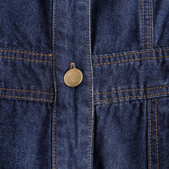 Dark blue denim sleeveless balloon jumpsuit with multiple pockets, designed for women, featuring a relaxed fit and stylish silhouette.