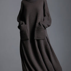 Brown knit maxi dress for women, flowing and stylish, featuring long sleeves and a comfortable fit, perfect for casual wear