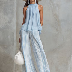 Light blue striped chiffon wide-leg women’s pants with a relaxed fit, featuring a flowy and elegant design.