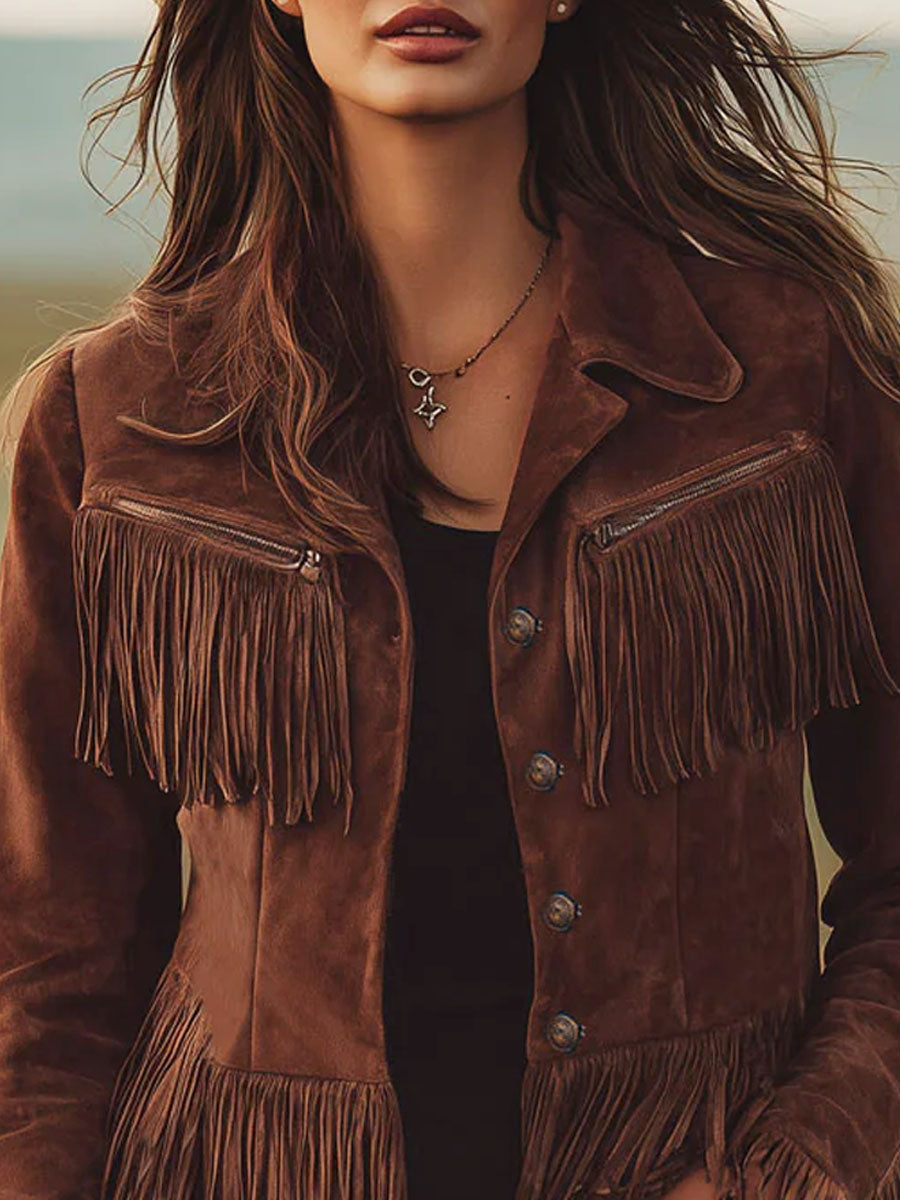 Brown suede Western tassel zip-up jacket with fringe details, stylishly displayed on a mannequin.