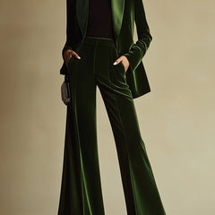 Emerald green velvet two-piece suit set for women, including loose pants and matching top, stylish and comfortable for various occasions.