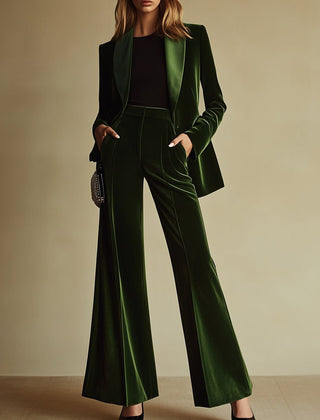 Emerald green velvet two-piece suit set for women, including loose pants and matching top, stylish and comfortable for various occasions.