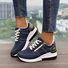Breathable women's orthopedic sneakers with non-slip soles, designed for comfort and support, featuring a stylish athletic look.