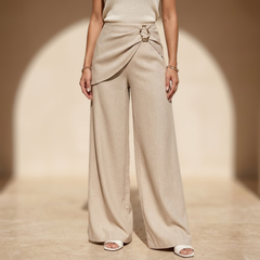 Beige asymmetric waist wide-leg women's pants with a relaxed fit, stylish and comfortable for casual or professional wear.
