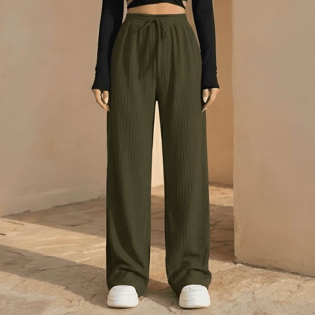 Women's plissé wide-leg trousers by Tammy Bradley, flowing and stylish pants for women, shown in a relaxed fit.