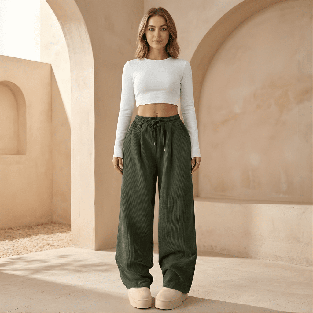 Women's corduroy relaxed wide-leg trousers by Tammy Bradley, shown in a casual fit with a high waist and wide legs.