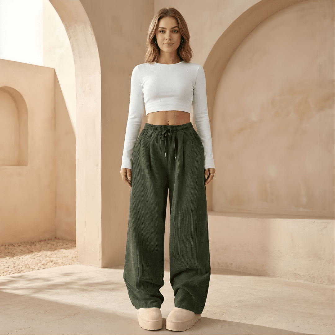 Women's corduroy relaxed wide-leg trousers by Tammy Bradley, shown in a casual fit with a high waist and wide legs.