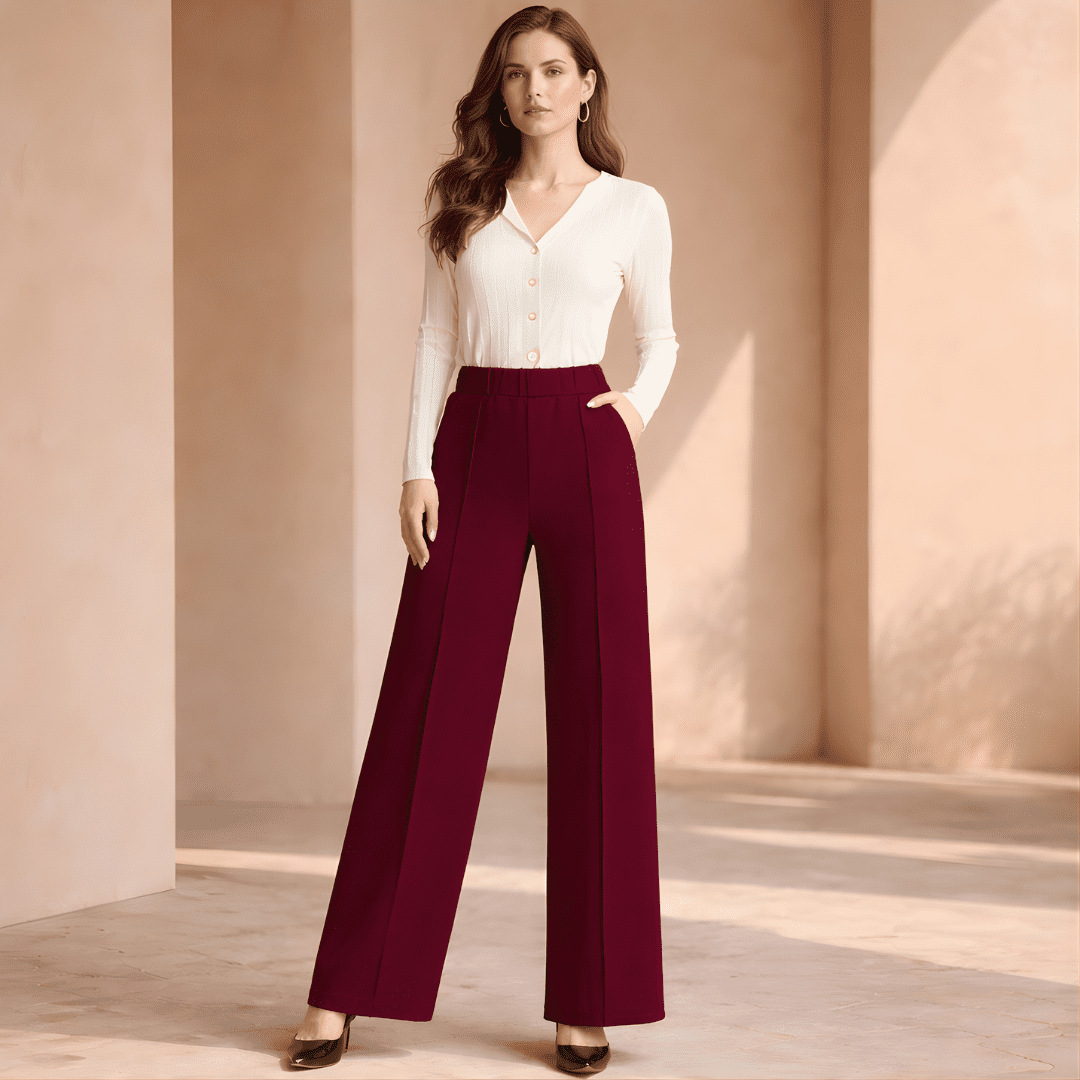 Women's tailored high-waist wide-leg trousers by Tammy Bradley, featuring a sleek fit and elegant style in a neutral fabric.