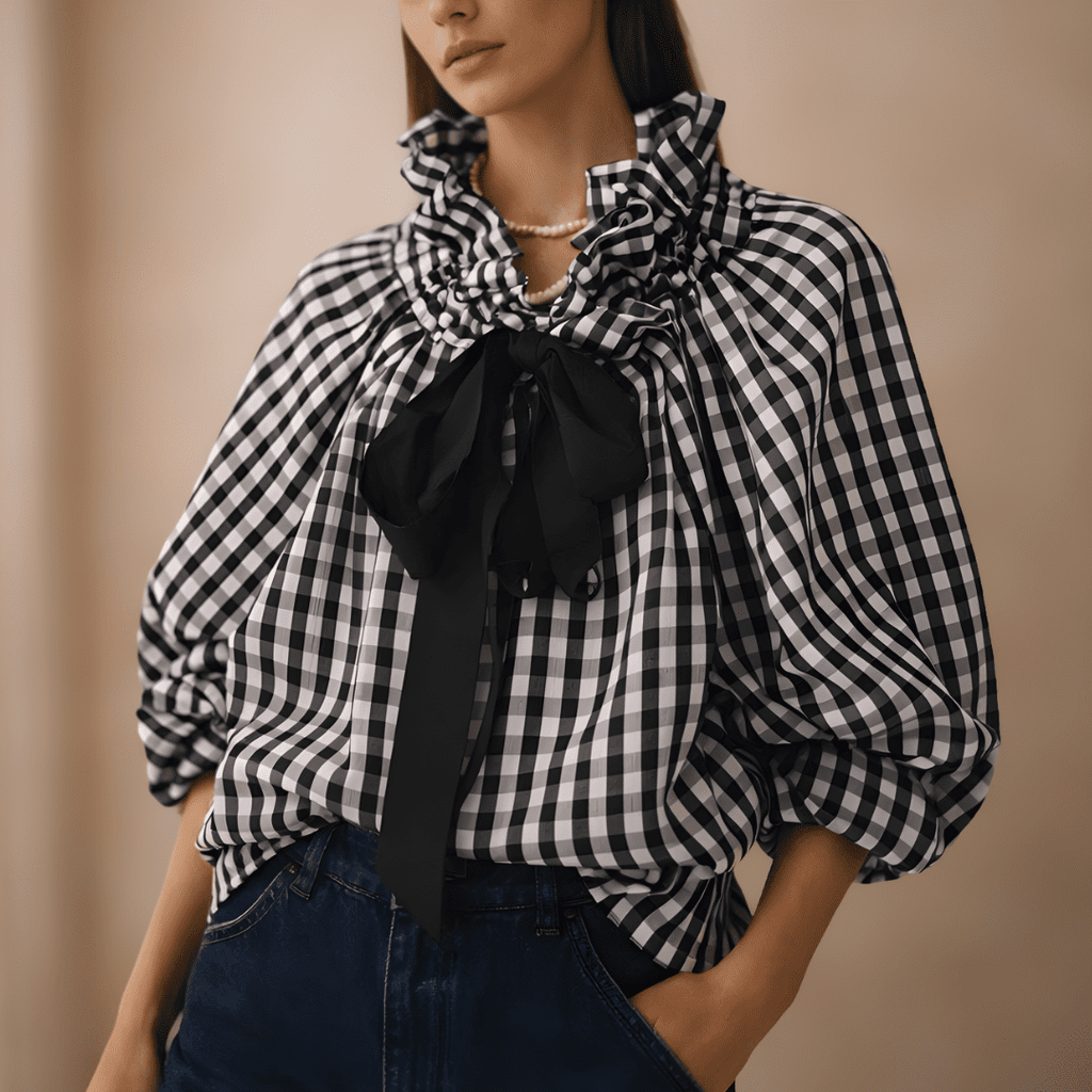 Gingham ruffle oversized long-sleeve blouse for women by Tammy Bradley, featuring a stylish and relaxed fit with ruffle details.