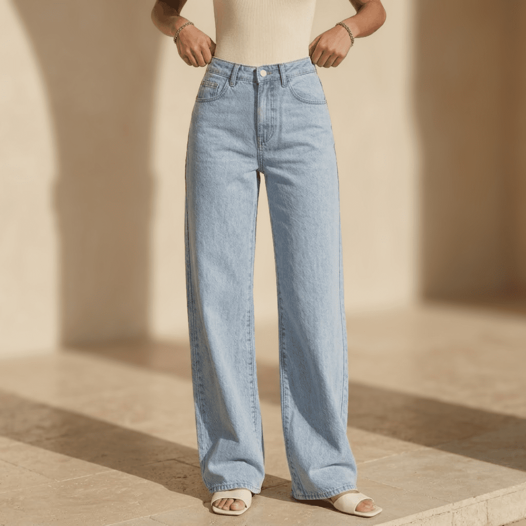 Women's high-waisted wide-leg denim jeans by Tammy Bradley, showing the stylish fit and classic blue denim fabric.