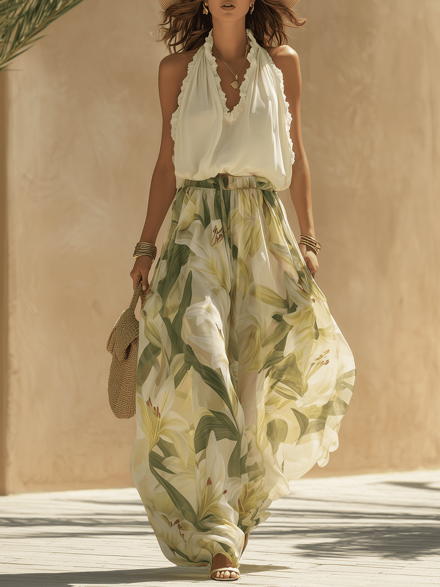 White flowing maxi dress for women by Tammy Bradley, featuring a lightweight, elegant design with a relaxed fit and feminine silhouette.