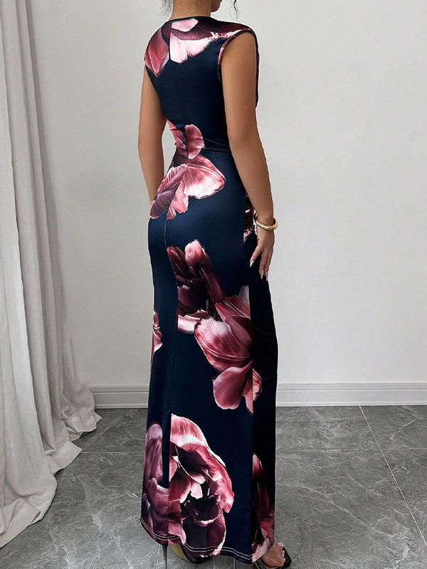 White bodycon sleeveless maxi dress with contrast color flower print and round neckline, stylish and elegant for summer wear.