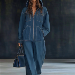 Women’s casual loose retro denim jumpsuit with hood, zipper front, long sleeves, and front pockets, stylish and comfortable.