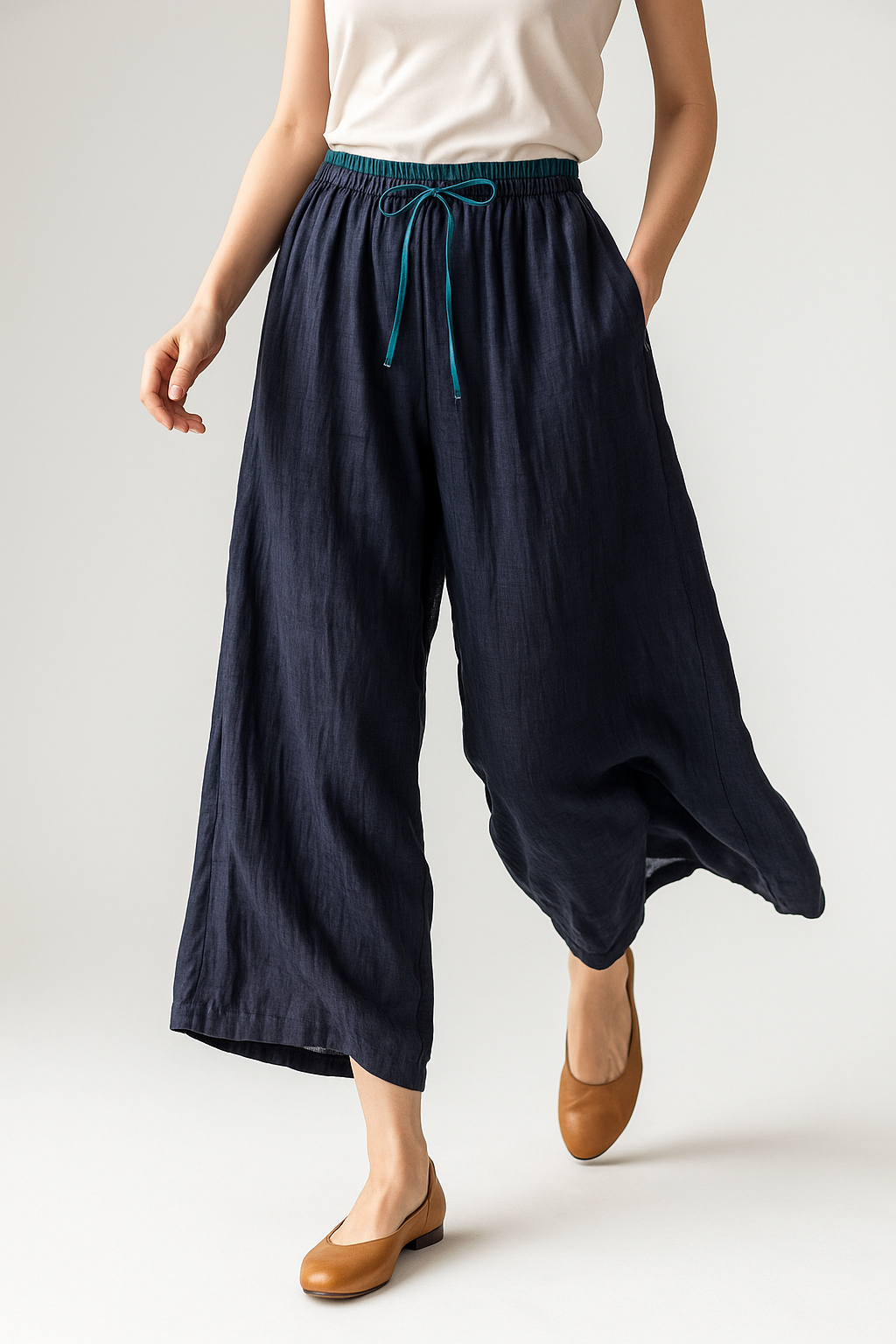 Tapered linen trousers for women from My Store featuring a loose, pull-on design and elegant, lightweight fabric.
