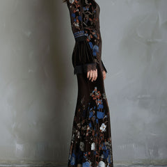 Velvet floral evening dress with elegant design, featuring intricate floral patterns and a sophisticated silhouette.
