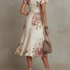 Elegant chiffon floral midi dress from My Store, showcasing a flowy evening dress with vibrant floral patterns and a fitted waist.