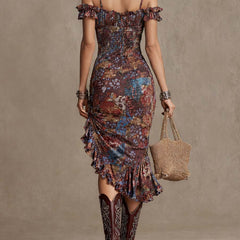 Floral midi dress by My Store featuring a flowy skirt and short sleeves, perfect for casual occasions, shown on a model.
