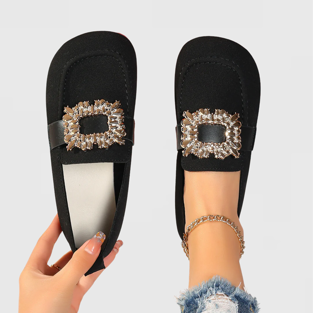 Women's orthopedic loafers with cushioned arch support, featuring a classic design and comfortable fit for everyday wear.