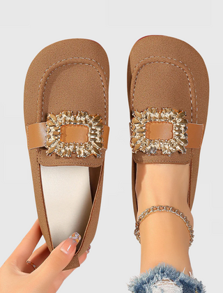 Women's orthopedic loafers by My Store with cushioned arch support, featuring brown leather uppers and slip-on style.